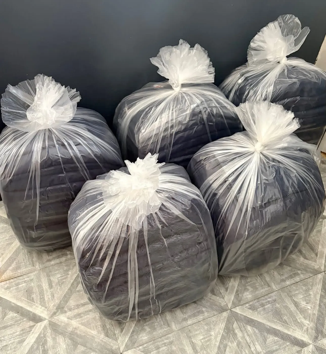 Bagged, folded laundry ready for delivery