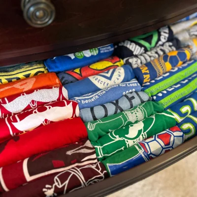 Neatly folded clothes organized in a drawer