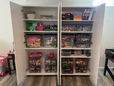 A children's toy cabinet after Lessen the Loads' Less Mess Express service